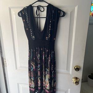 Sleeveless cinched waisted dress